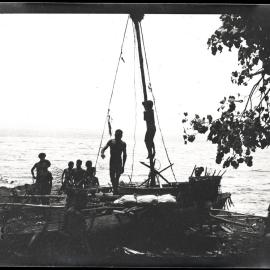 [Manum Island, New Guinea] Preparing for a Voyage. Small Boy Slips the Rope for Hoisting the Sail Over the Block