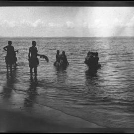 [Manum Island, New Guinea] Mourners Washing Themselves After an Interment