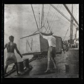 [Ocean Island] Lowering the Case of Explosives into the Whale Boat