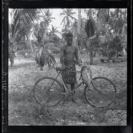 [Narau] A Nauruan Taking his Catch to Sell in the Chinese Quarter, a Common Sight in the Afternoon