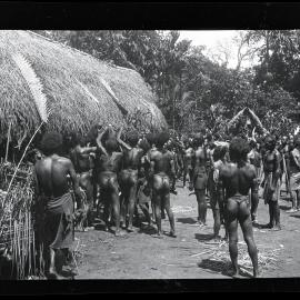 [Manum Island, New Guinea] Removing the Food