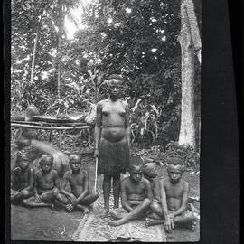 [Manum Island, New Guinea] This Same Girl and her Maids in Waiting Wearing their Ornamental Anklets just Before Being Painted