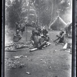[Manum Island, New Guinea] The Men of Yassa in Mamboti’s Homestead with Some of the Food Which They Have Brought in Honour of the Occasion