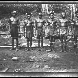 [Manum Island, New Guinea] Tsu'ua and Two Co-initiates in their Ornaments. 