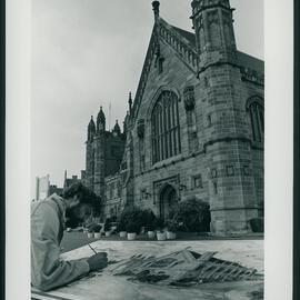 Artist Painting the Main Building