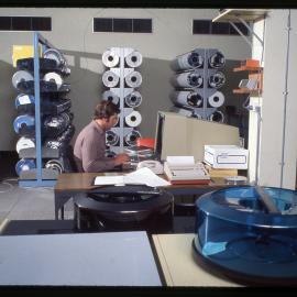 Man at Desk in Audio-Visual Library
