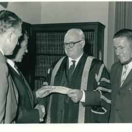 Presentation of Cheque by the US Consul-General, Mr Laurence C Vass to Assist in the Construction of Mills Cross Radio Telescope