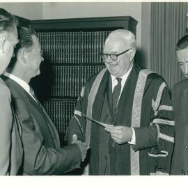 Presentation of Cheque by the US Consul-General, Mr Laurence C Vass to Assist in the Construction of Mills Cross Radio Telescope