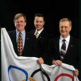 Sandy Hollway, Craig Hassall, Jane Spring and John Coates with Olympic Flag