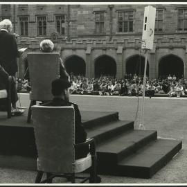 Sir Hermann Black Addressing the Audience at the Inauguration of the Rebuilt Carillon in the Quad