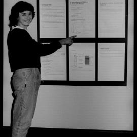 Anna De Fazio With Her Poster on a New Reagent for DNA Analysis