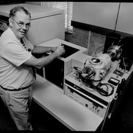 Professor Tom Watson with Triple Stage Quadruple Mass Spectrometer