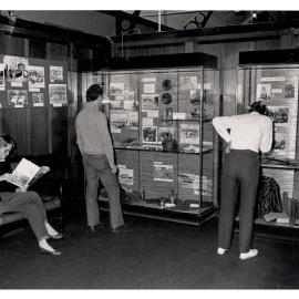 Visitors Looking at a Display in the Macleay Museum