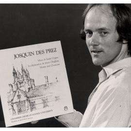 Dr Nicholas Routley Holding the Album Released by the Chamber Choir of Sydney University